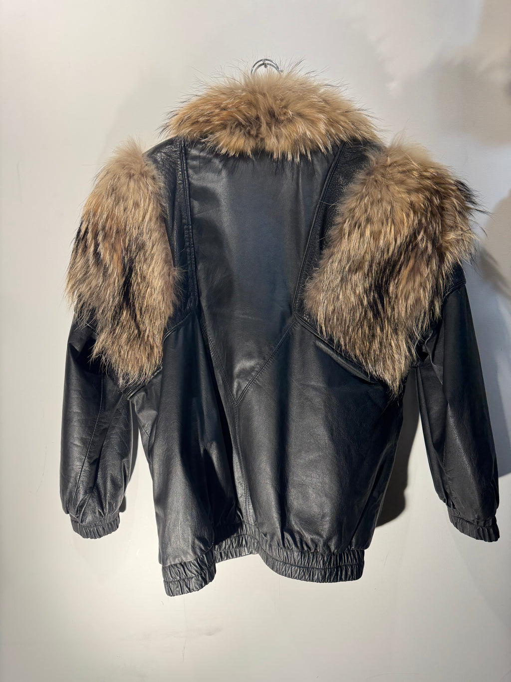Vintage Black Leather Bomber Jacket with Raccoon Fur Collar
