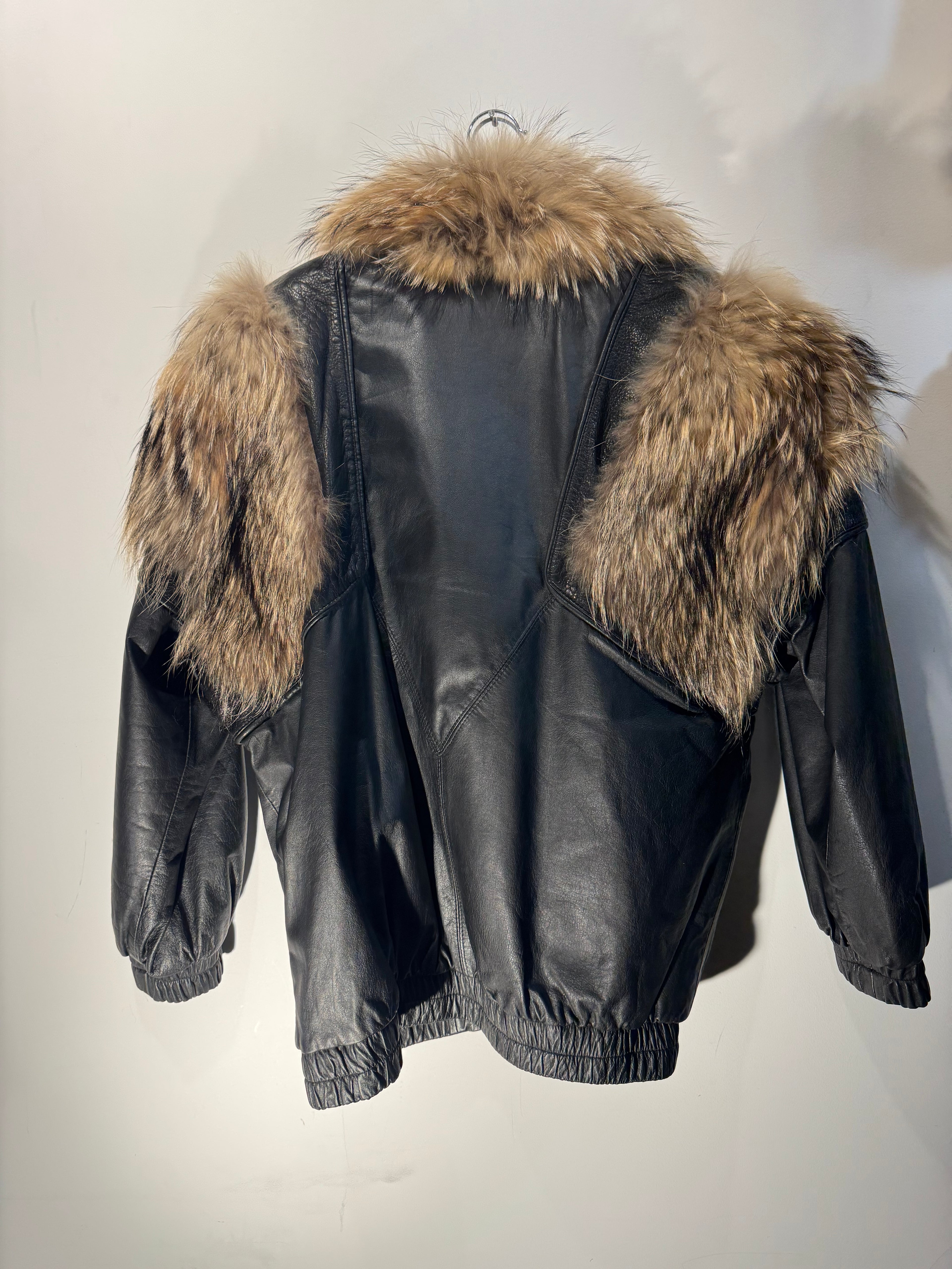 Vintage Black Leather Bomber Jacket with Raccoon Fur Collar