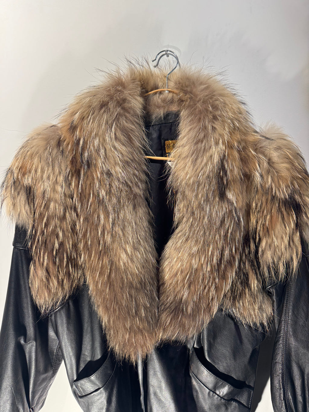 Vintage Black Leather Bomber Jacket with Raccoon Fur Collar