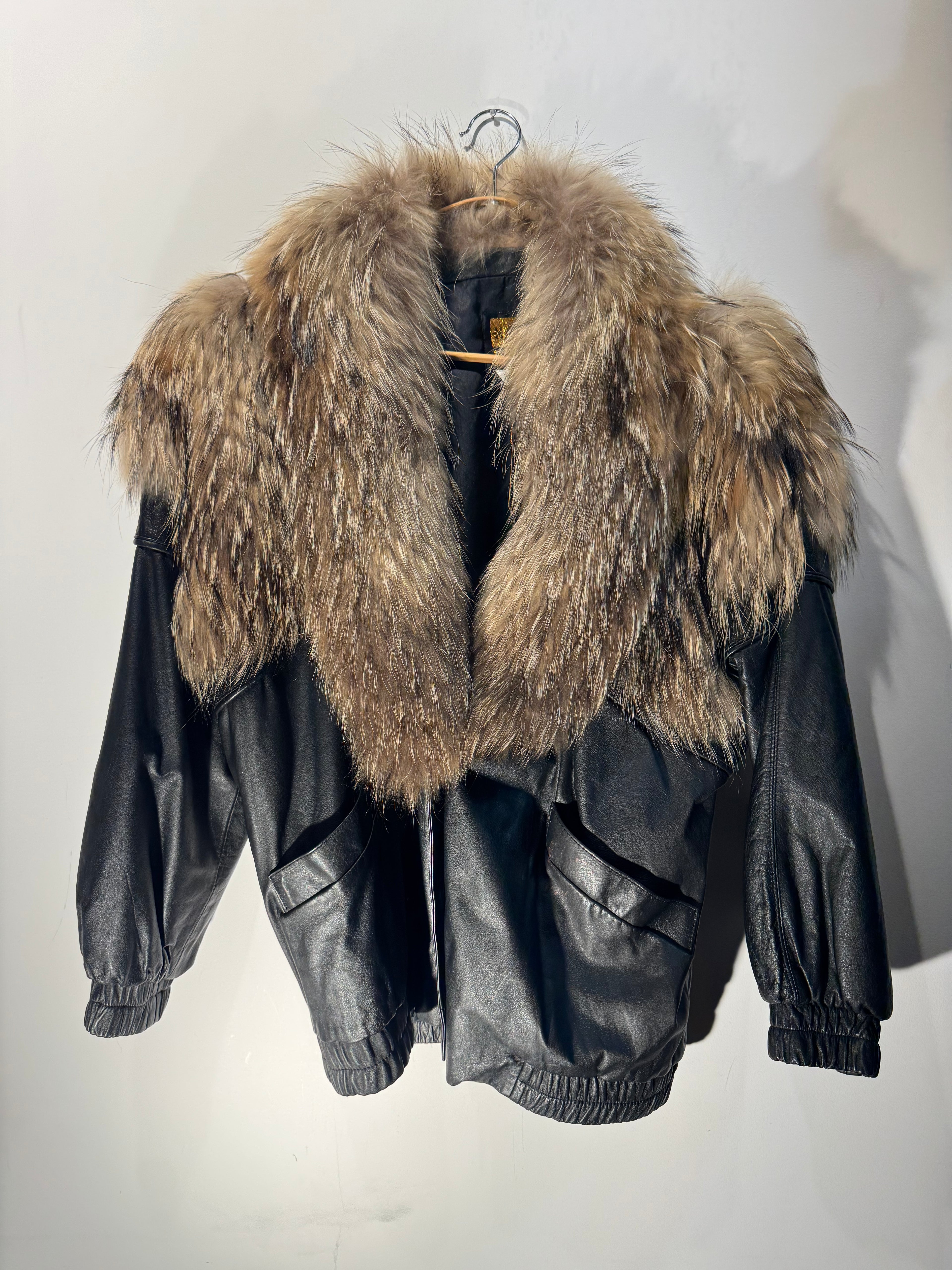 Vintage Black Leather Bomber Jacket with Raccoon Fur Collar