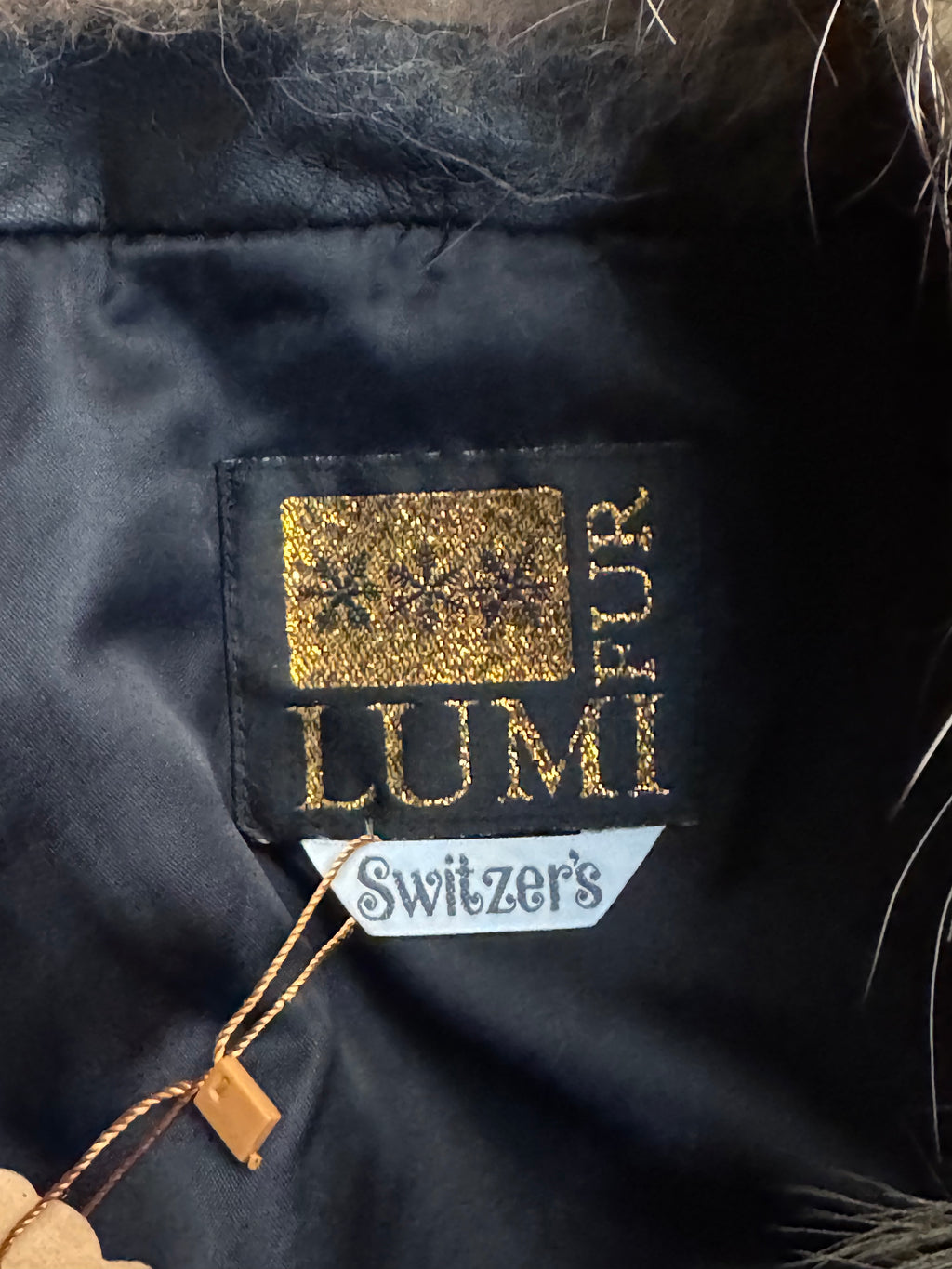 Vintage Black Leather Bomber Jacket with Raccoon Fur Collar